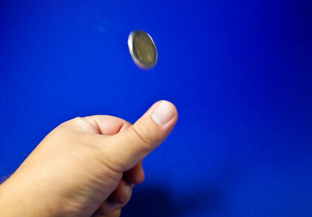 Utter toss Coin tossing (CC licensed by Gerwin Sturm via Flickr)