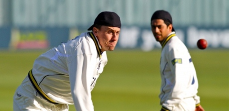 Rikki Clarke stares out a floating cricket ball